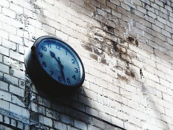 Close-up low angle view of clock