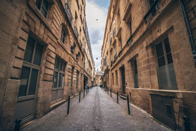 Narrow alley along buildings