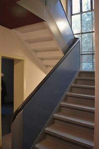 Low angle view of spiral staircase in building