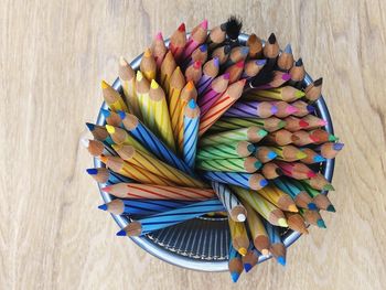 High angle view of multi colored pencils on table