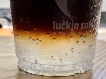 Close-up of glass of water on table