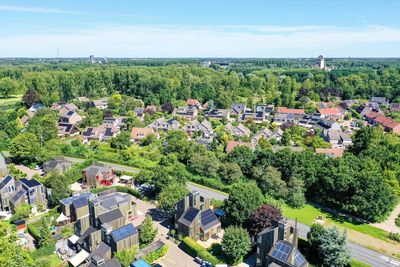 High angle view of trees and houses against sky