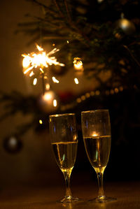 Close-up of champagne flutes on table