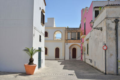 A street in the historic center of specchia, a medieval town in the puglia region, italy.