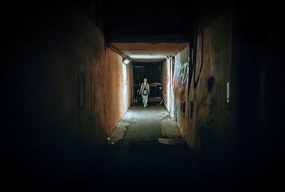 People standing in illuminated building