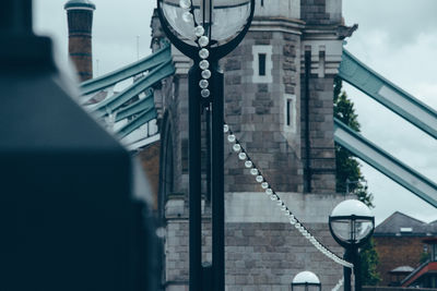 Light bulbs. city lights. depth of field. perspective. bridge. lights in line. focus on ground. 