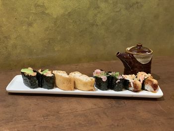 View of sushi in plate on table