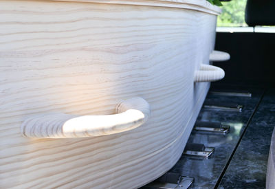 Close-up of white wooden table