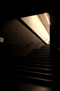 Low angle view of illuminated staircase in building