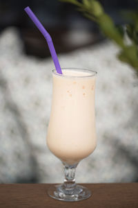 Close-up of a milkshake in glass on table