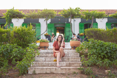 Happy young woman on a farm in the countryside