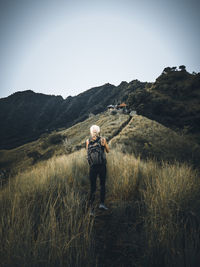 A woman standing at the hill in pemuteran bali.