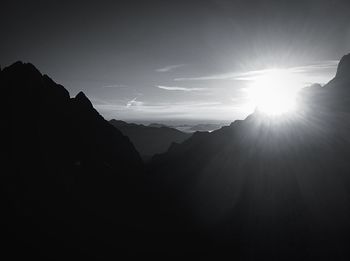 Silhouette mountains against sky