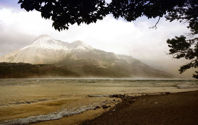 Scenic view of beach against sky