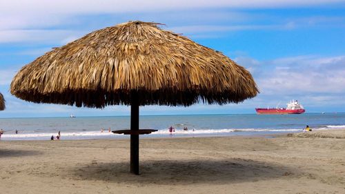 Scenic view of beach against sky