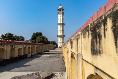 View of buildings against blue sky