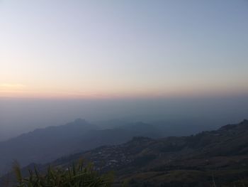 Scenic view of mountains against sky during sunset