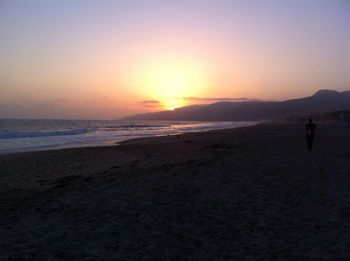 Scenic view of sea at sunset