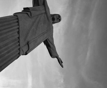 Low angle view of statue against sky