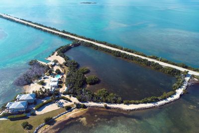 High angle view of swimming pool by sea