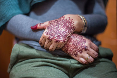 Close-up of woman hand with tattoo