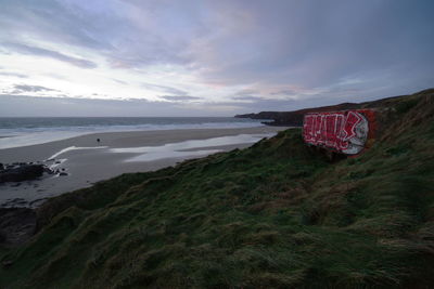 Scenic view of beach against sky