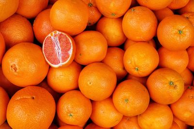 Full frame shot of oranges in market