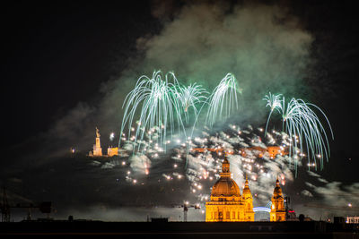 Firework display at night