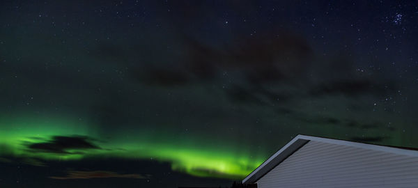 Low angle view of building against sky at night