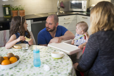 Family having meal together