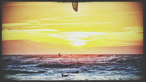 Scenic view of sea at sunset
