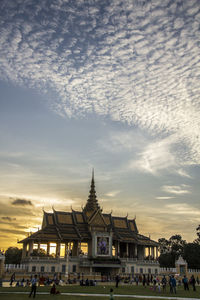 Group of people in temple against building