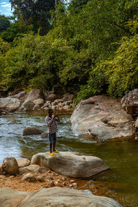 High angle view of man standing in water