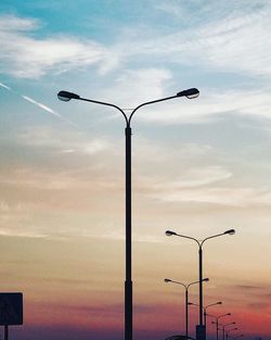 Low angle view of street light against sky