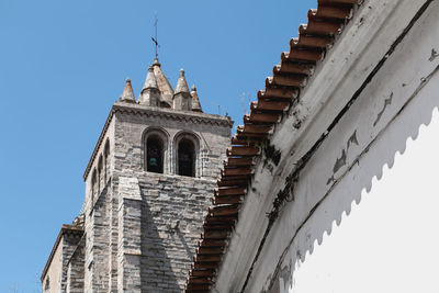 Low angle view of buildings against clear sky