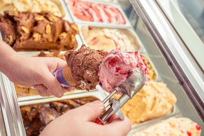 Hand holding ice cream