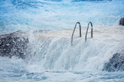 View of swimming pool in sea