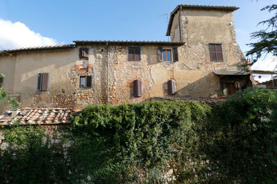 Low angle view of old building against sky