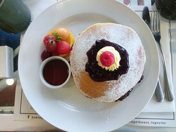 Close-up of cake served on table