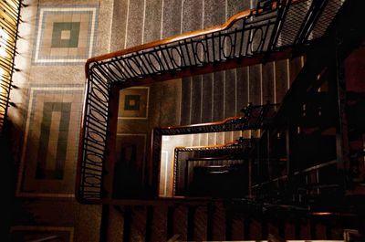 Low angle view of spiral staircase in building