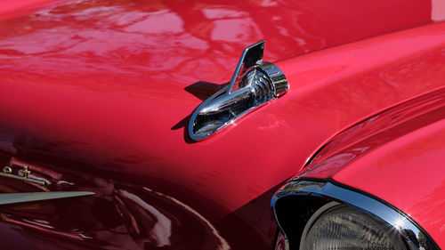 Close up image of classic chevrolet grille and engine compartment