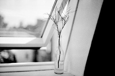 Close-up of glass window on wall