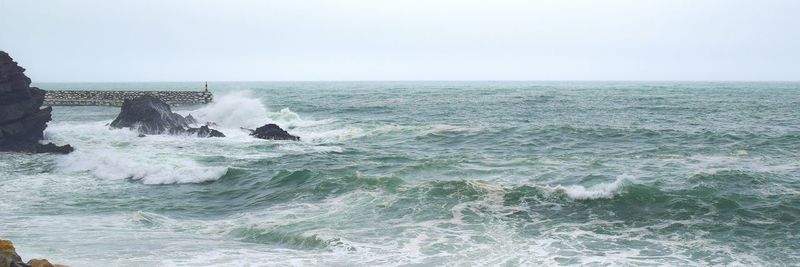 Scenic view of sea against clear sky