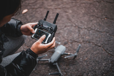 High angle view of person photographing