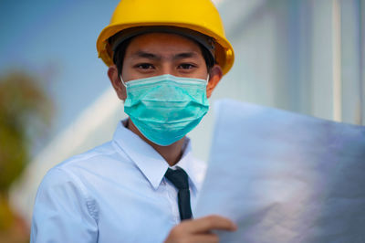 Portrait of man wearing protective mask