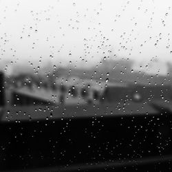 Close-up of water drops on glass