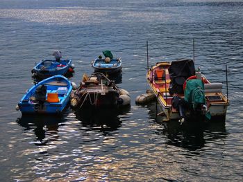 People in boat in sea