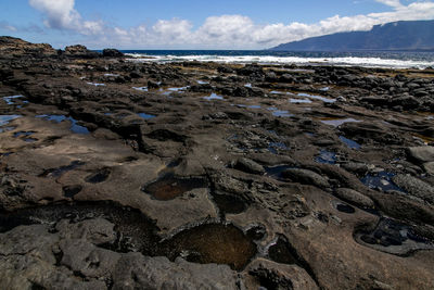 Scenic view of beach against sky