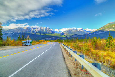 Country road passing through landscape