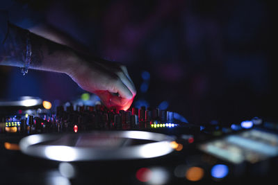 Closeup on dj hands during dj set